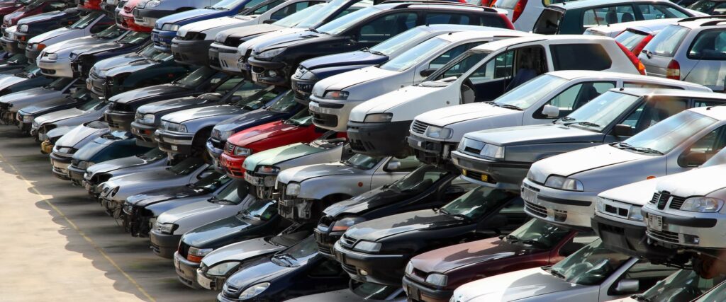 scrap cars in a row 1